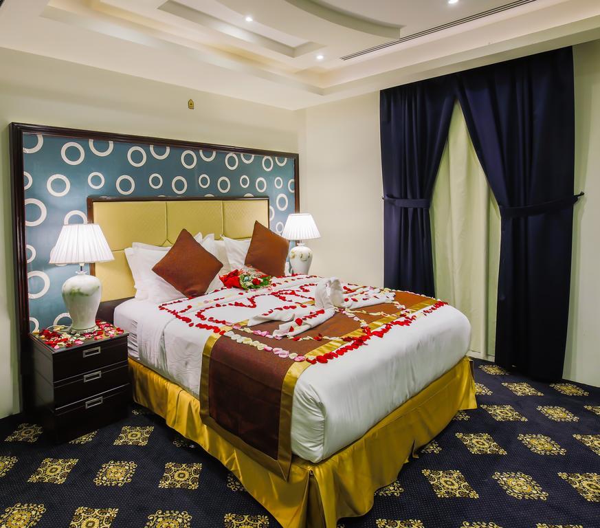 休息之夜公寓酒店 利雅德 外观 照片 A bedroom in a hotel