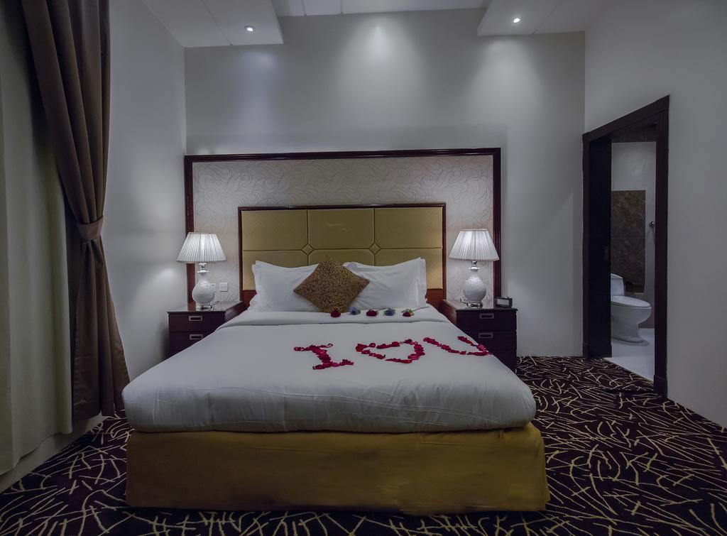 休息之夜公寓酒店 利雅德 外观 照片 A bedroom in the hotel