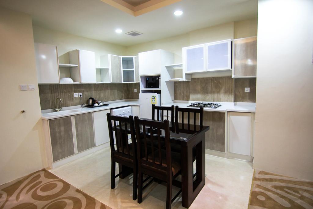 休息之夜公寓酒店 利雅德 外观 照片 A modern kitchen