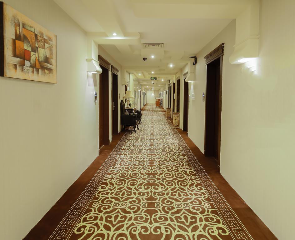 休息之夜公寓酒店 利雅德 外观 照片 A corridor at the hotel