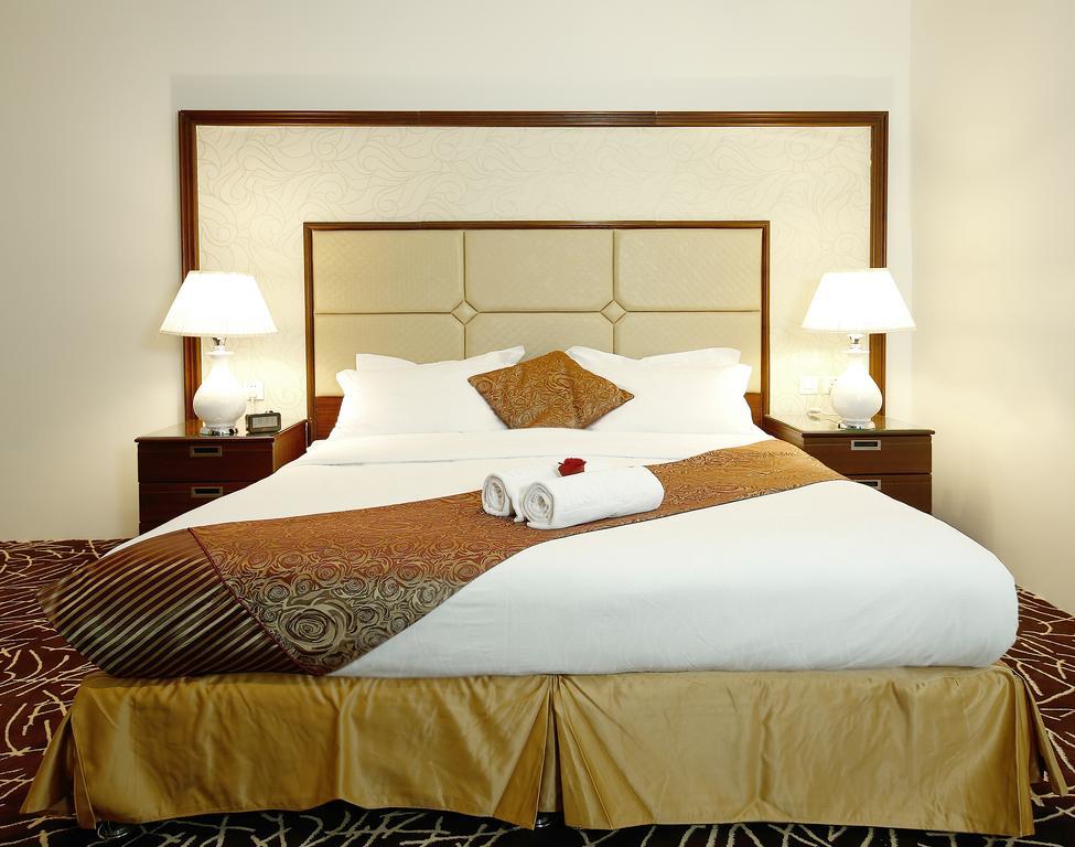 休息之夜公寓酒店 利雅德 外观 照片 A bed